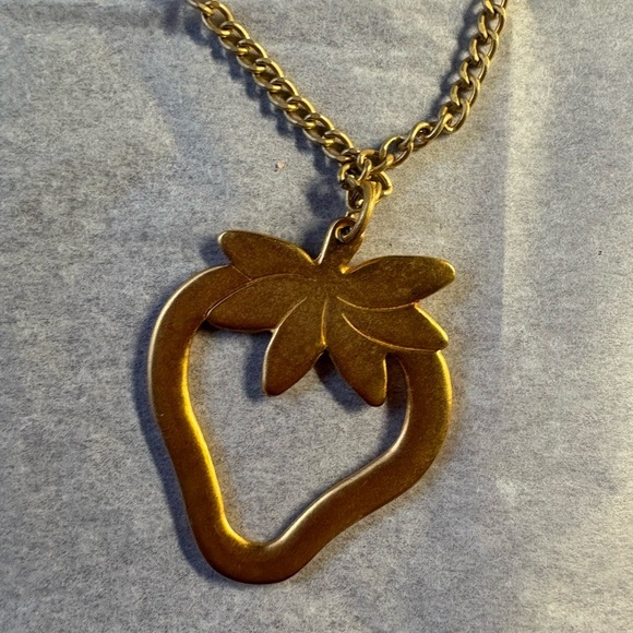 Gold tone and Pink Foxy brand Strawberry Necklace with Green Leaf Accent - Picture 3 of 4